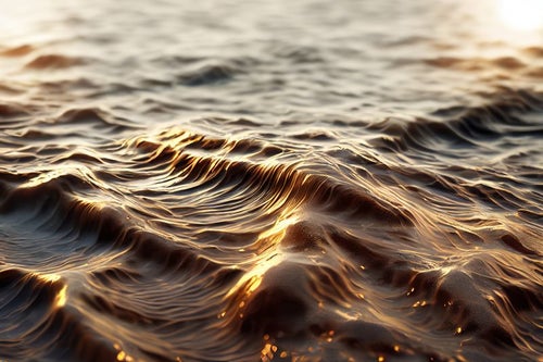 夕焼け色の波の写真