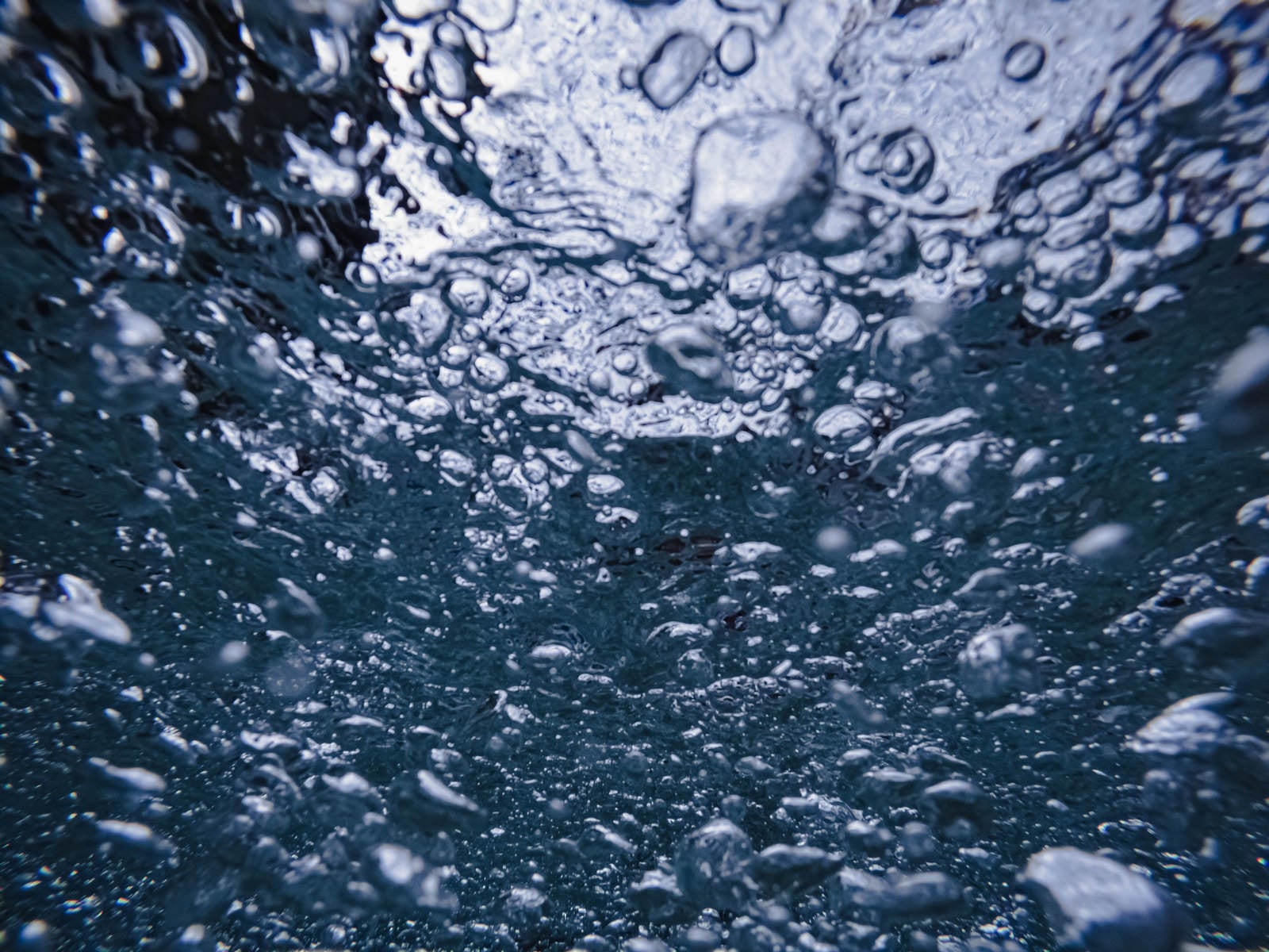 「水中に浮かぶ気泡のテクスチャー」の写真