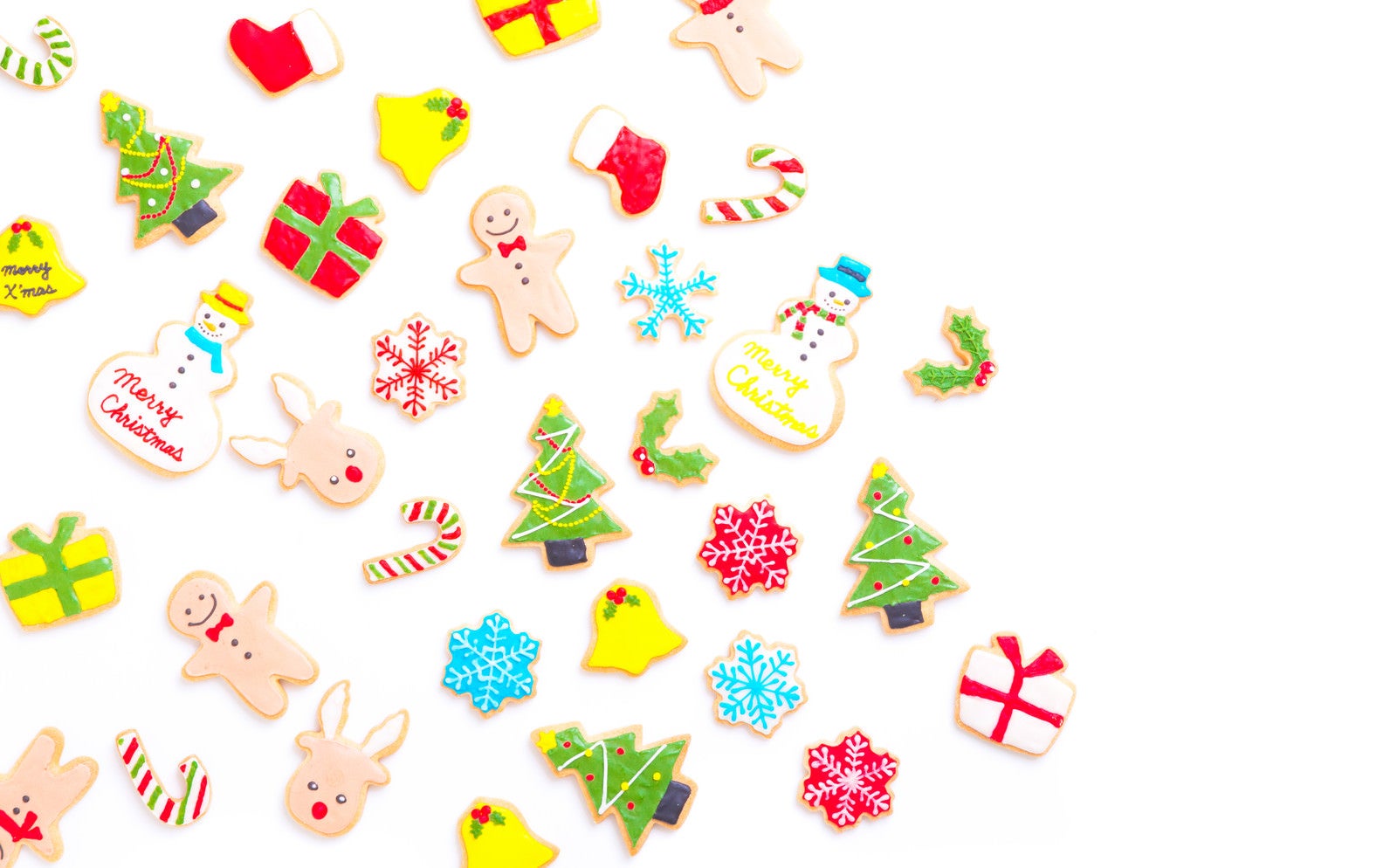 「散らばったクリスマス・アイシングクッキー」の写真