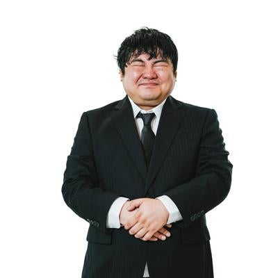 スーツを着ておもてなしの写真