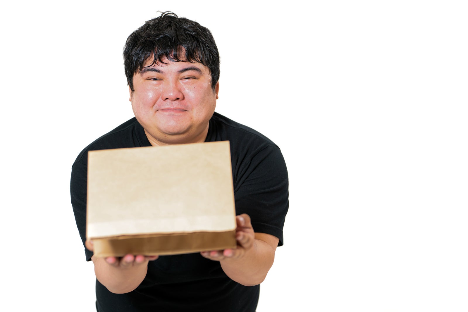 「小包を受け取る簡単なアルバイト」の写真［モデル：段田隼人］