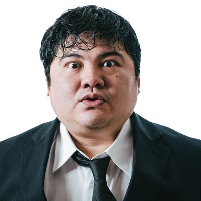 目力の強い男性会社員の写真