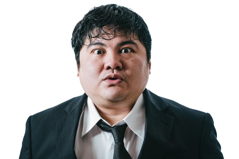目力の強い男性会社員の写真