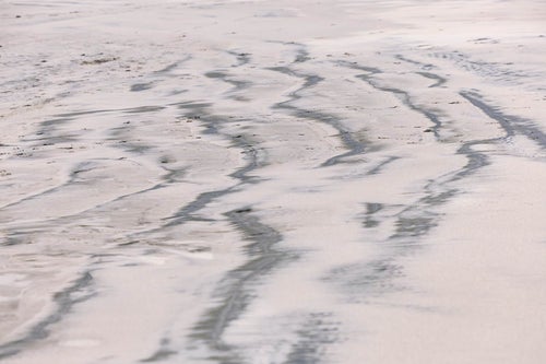 北泉海岸の引き潮の砂浜模様の写真