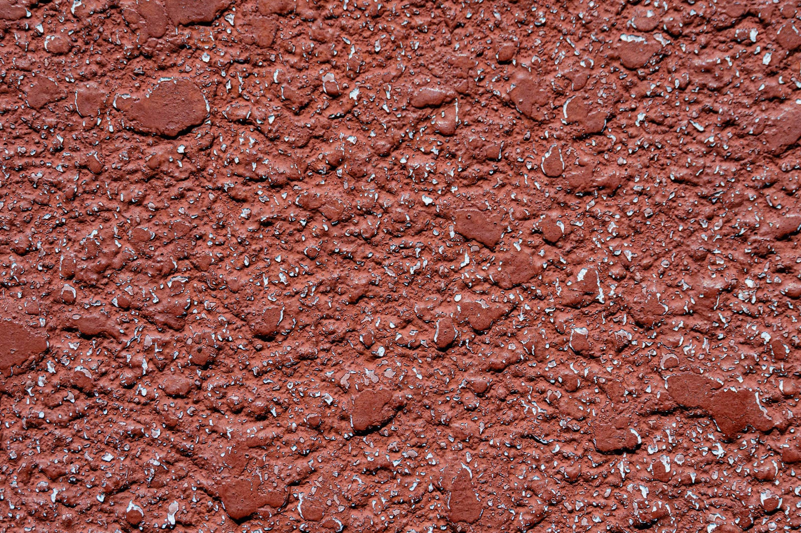 「表面が欠けるモルタル壁のテクスチャー」の写真