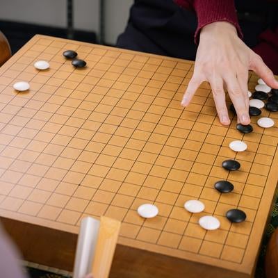 ノゾキの圧力をはねのける、棋士の冷静な一手の素材