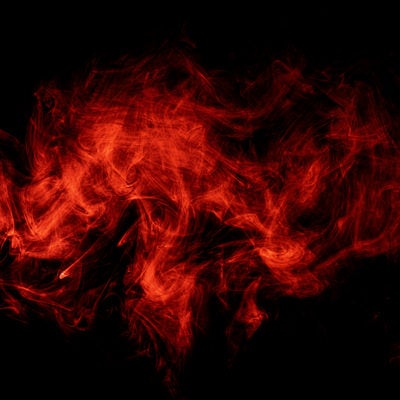 赤く浮かぶスモークの写真