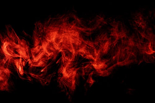 赤く浮かぶスモークの写真