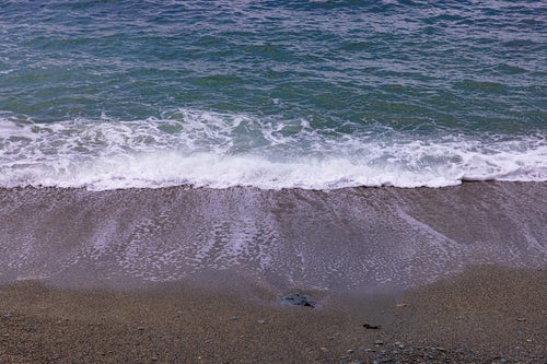 波打ち際の浜辺の写真