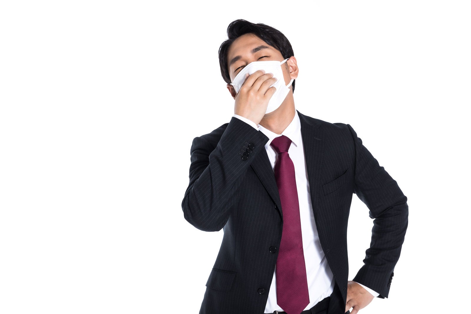 「インフルエンザでふらふらの会社員」の写真［モデル：大川竜弥］