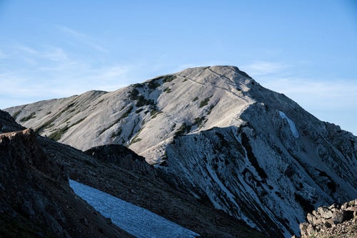 夕焼けに染まる白馬鑓ヶ岳の写真