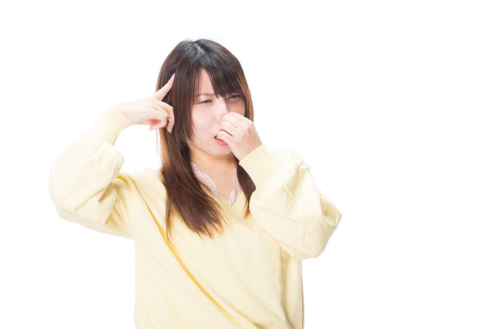 「悪臭で頭痛がひどい女性」の写真［モデル：Lala］