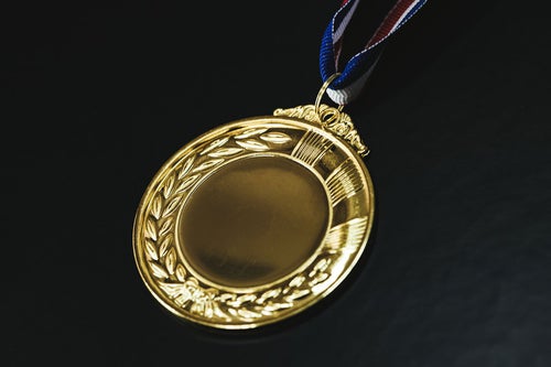 安っぽい金メダルの写真