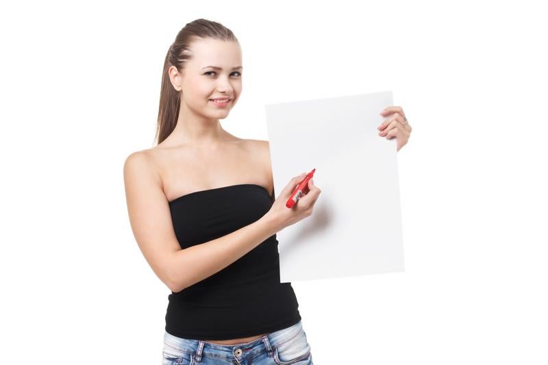 Woman Smiling with Red Pen and White Paper