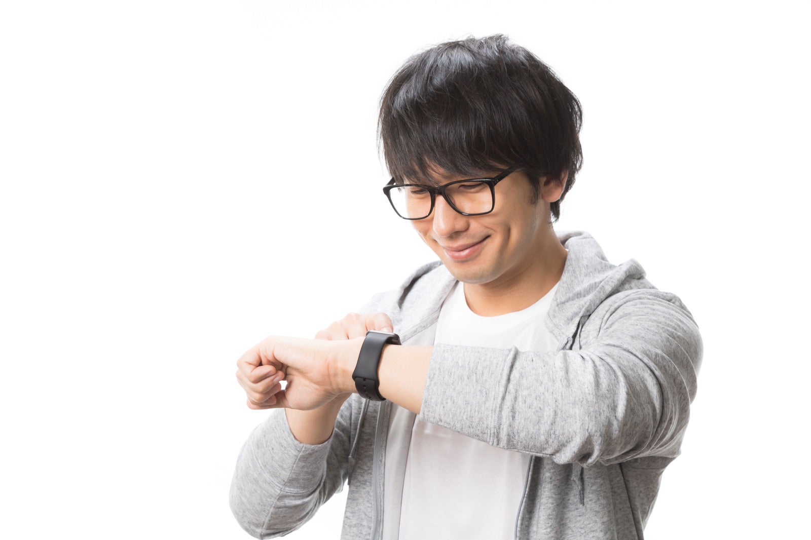 「Apple Watchを使いこなす男性」の写真［モデル：大川竜弥］