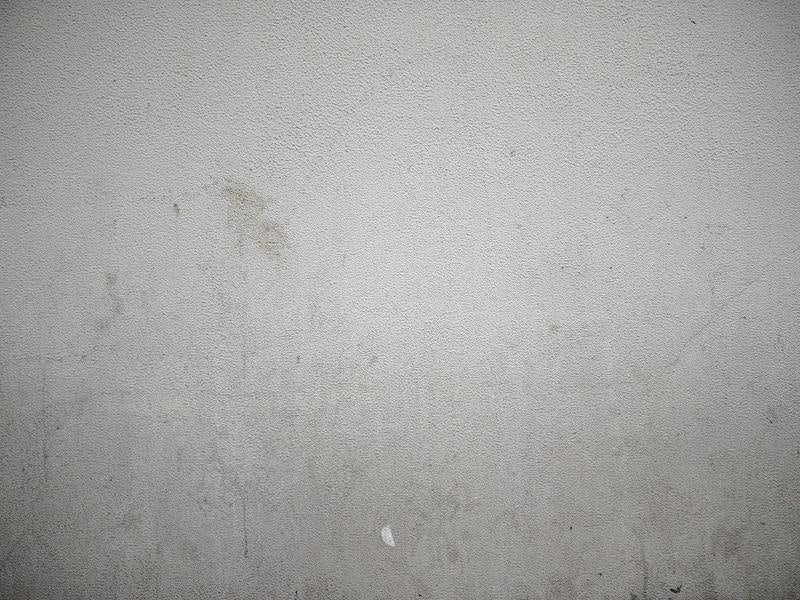 シミ汚れた外壁のテクスチャーの写真