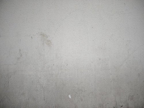 シミ汚れた外壁のテクスチャーの写真