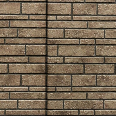 レンガ調タイル壁と継ぎ目のテクスチャーの写真