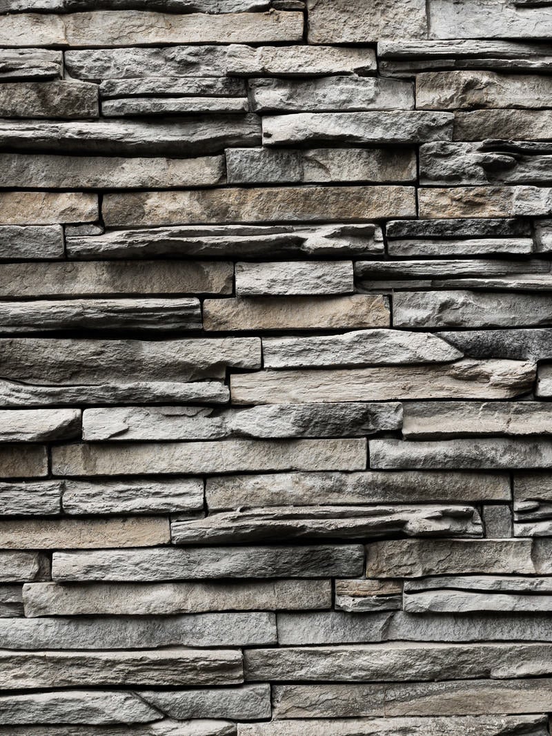 「石材タイルの凸凹壁」の写真