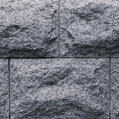 ボコボコの大きな石材タイルのテクスチャーの写真