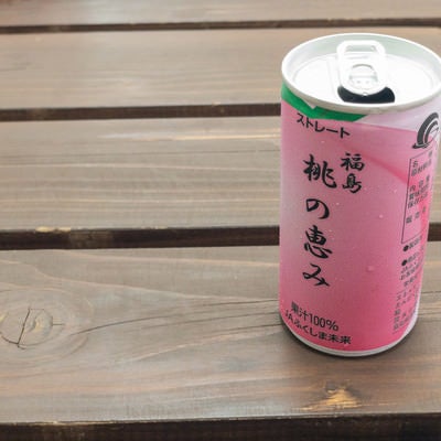 桃の恵み缶の写真