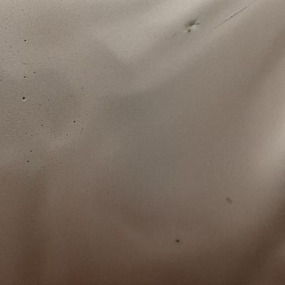 グラデーションがかかったベージュ系の布の素材