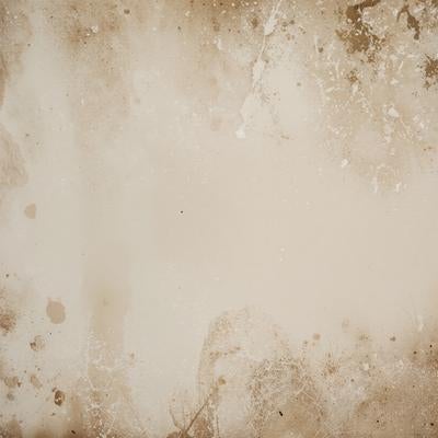 端に濃淡あるシミが広がるアンティーク紙のテクスチャーの写真