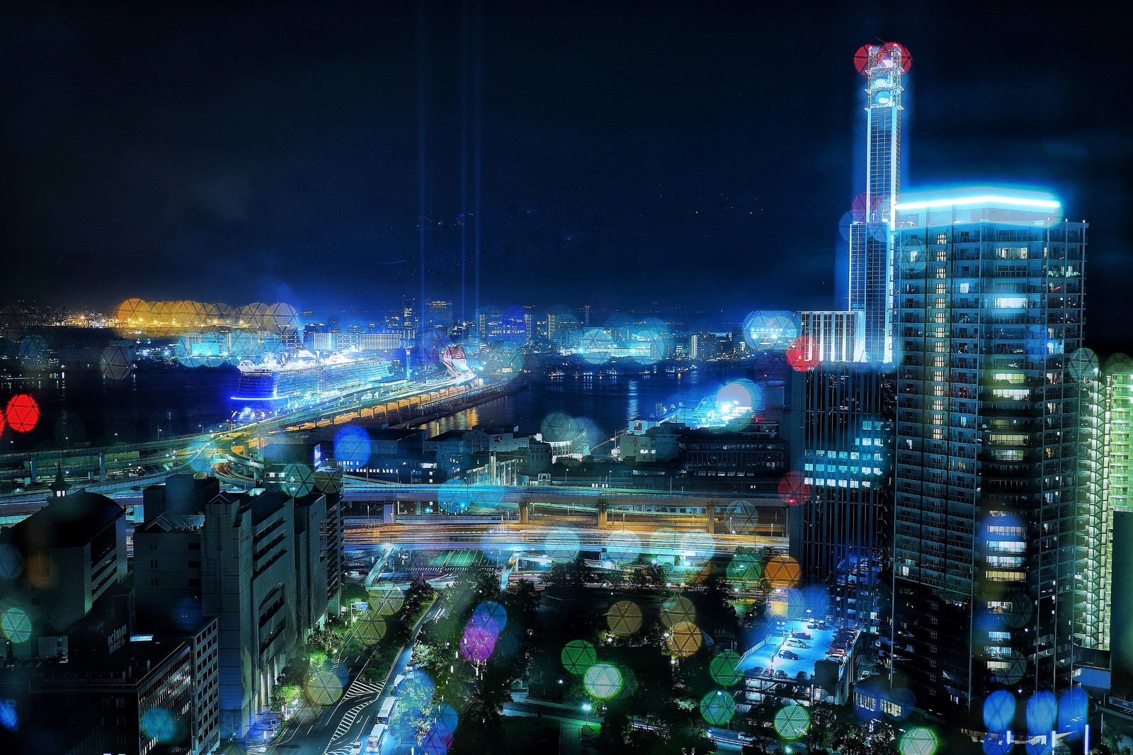 「カラフルなボケと都市夜景」の写真
