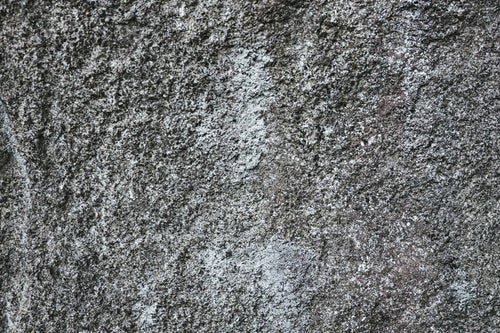 表面が削れたコンクリート壁（テクスチャー）の写真