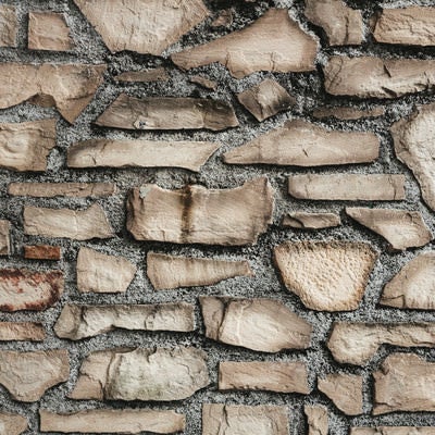 割れたレンガで造られた壁（テクスチャー）の写真