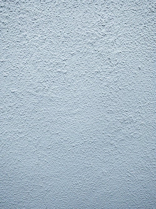 白く塗られた外壁（テクスチャー）の写真