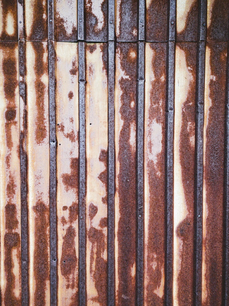 「錆び付いたトタンの壁（テクスチャー）」の写真