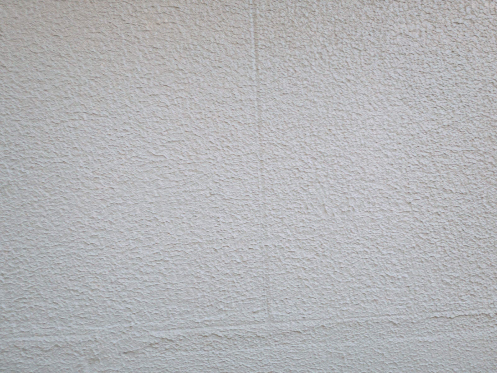 「全体に塗り跡残る外壁のテクスチャー」の写真