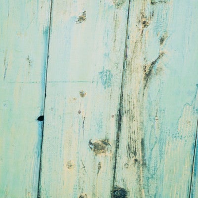 木目と節の汚れが強調された板（テクスチャー）の写真