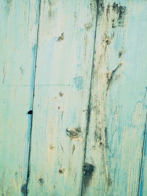 木目と節の汚れが強調された板（テクスチャー）の写真