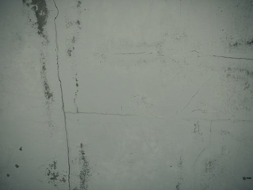 クラック入りのコンクリート壁のテクスチャーの写真