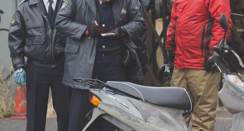 警察から不審車両（バイク）で質問を受けるの写真