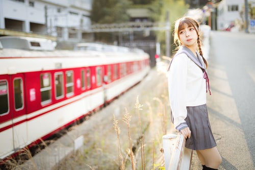 神戸電鉄有馬線と女子高生の写真