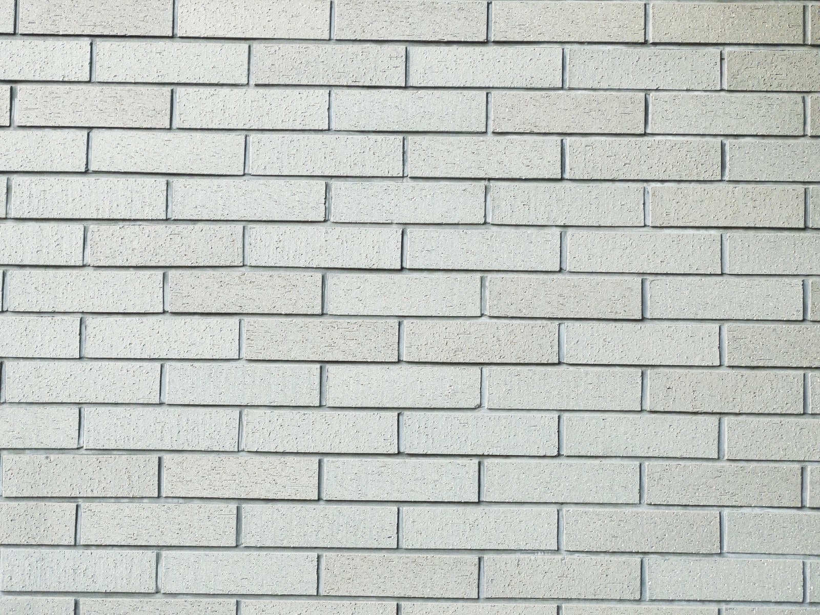 「新調したレンガ調タイルの壁（テクスチャー）」の写真