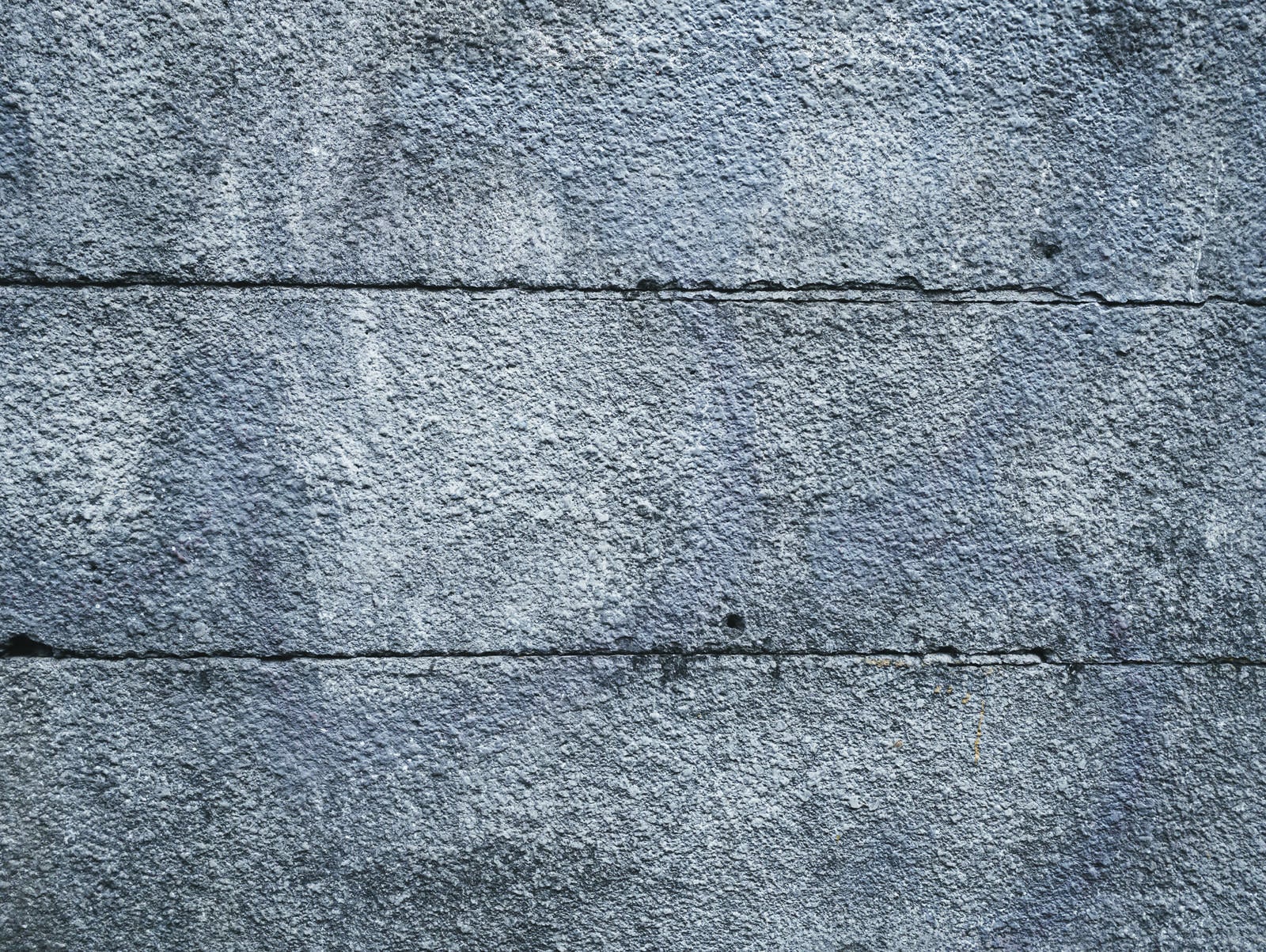 「年季の入ったコンクリート壁（テクスチャー）」の写真