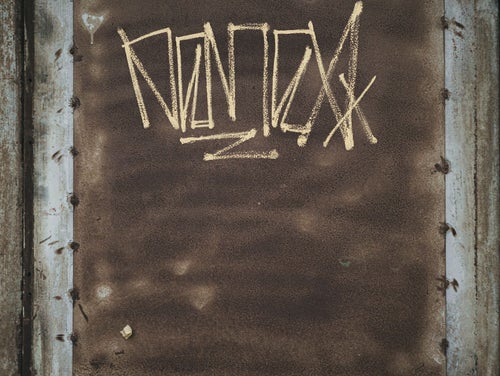 落書きが残る仕切り壁（テクスチャ）の写真