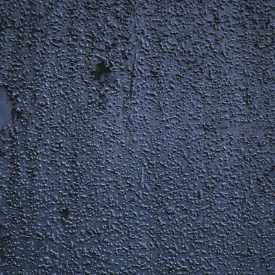 表面に細かいブツブツの残る壁（テクスチャ）の写真