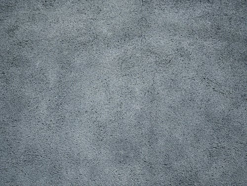 コンクリートの表面の斑なシミの写真