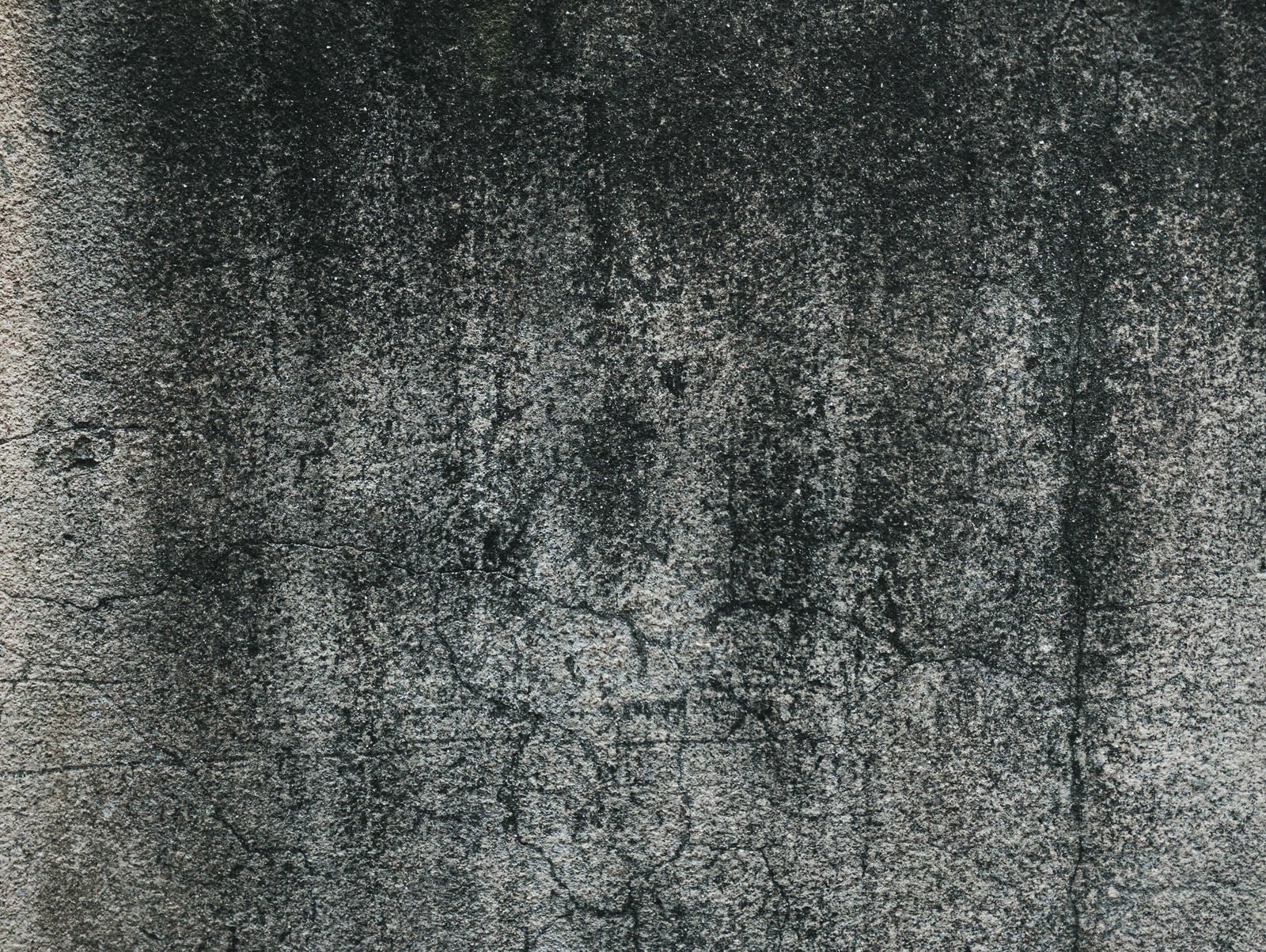 「クラックの入ったコンクリート壁（テクスチャ）」の写真