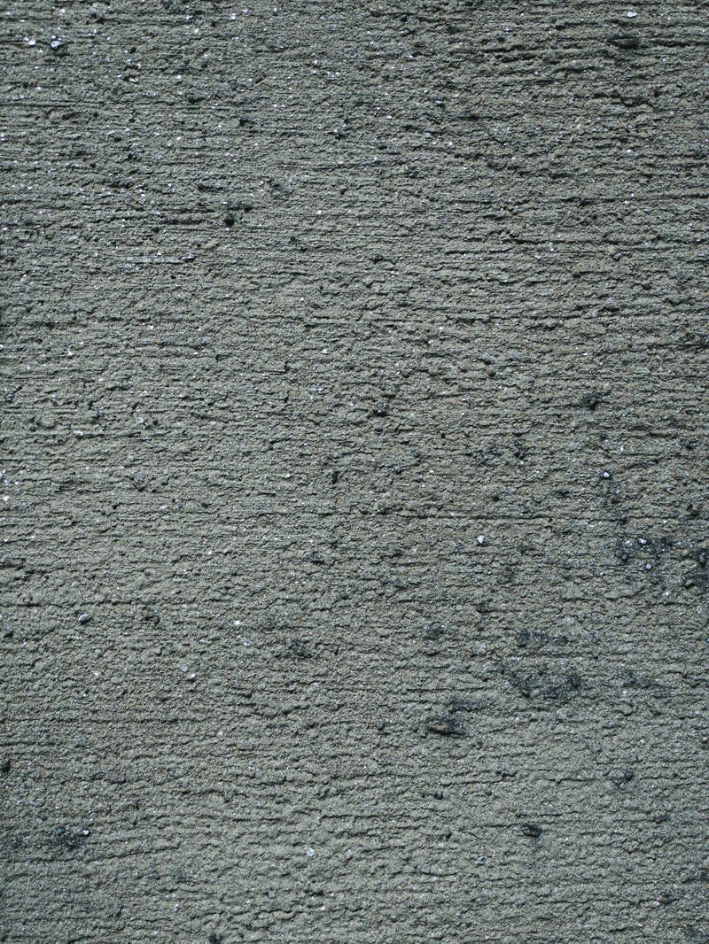 「ザラザラ感のあるコンクリート壁」の写真