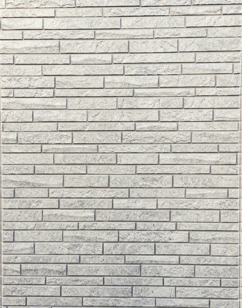 レンガ調の石材タイルの外壁（テクスチャー）の写真