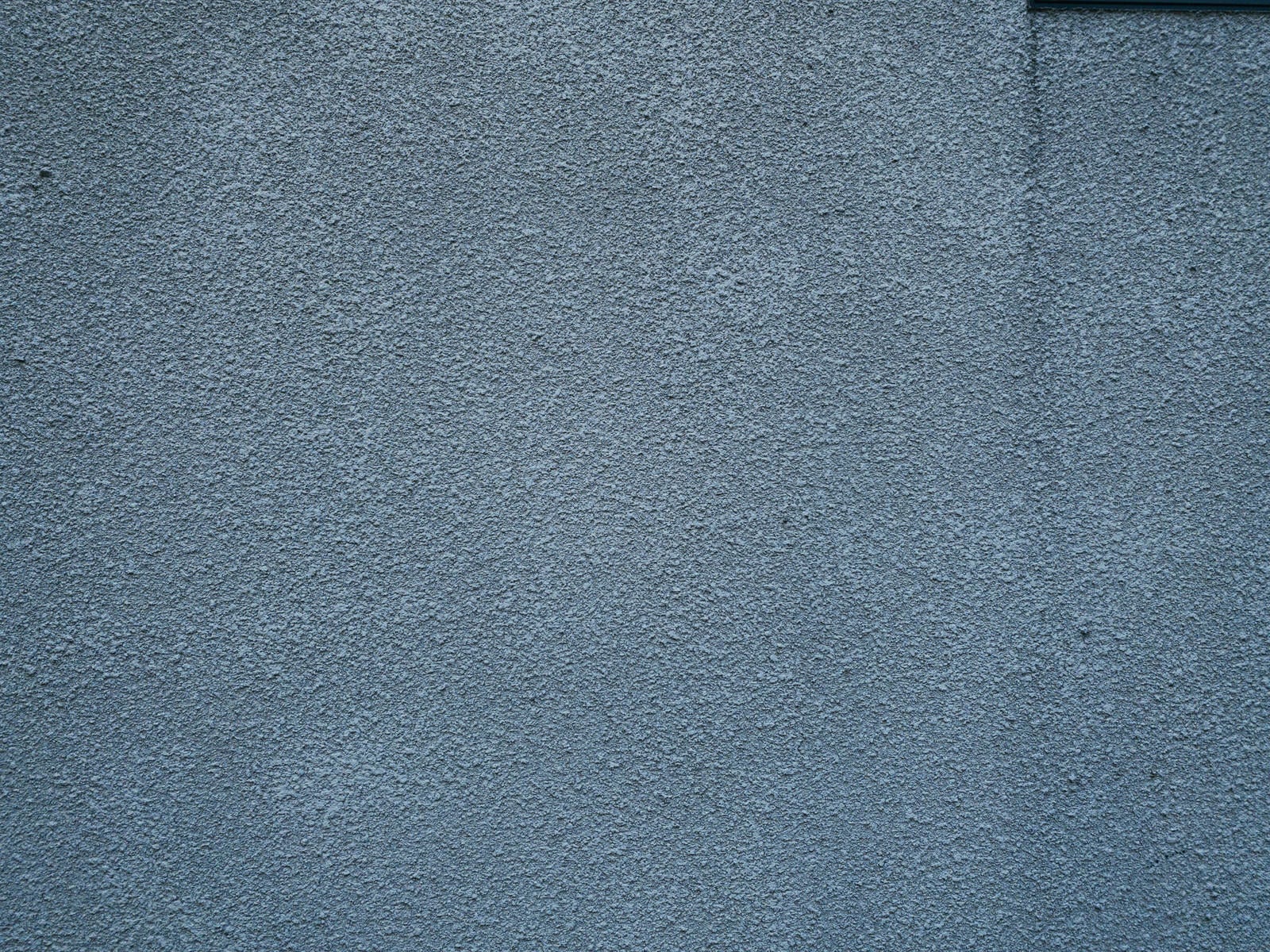 「雨ダレのモルタル壁（テクスチャ）」の写真