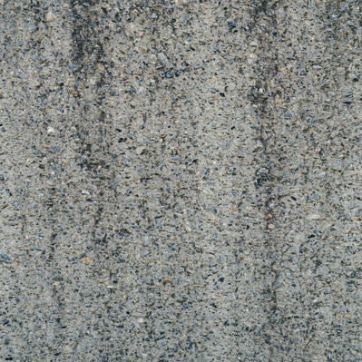 砂利の混ざったセメント壁（テクスチャ）の写真