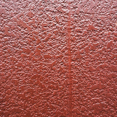 茶色にペイントされたモルタル壁（テクスチャ）の写真