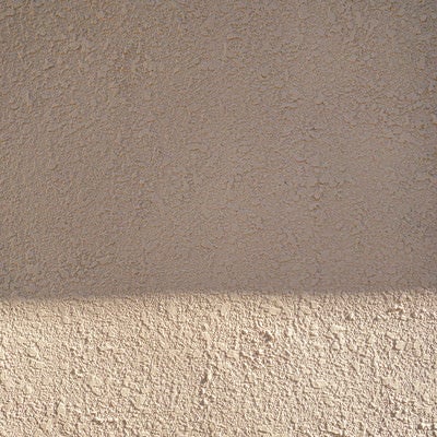 モルタルに出来た壁（テクスチャ）の写真